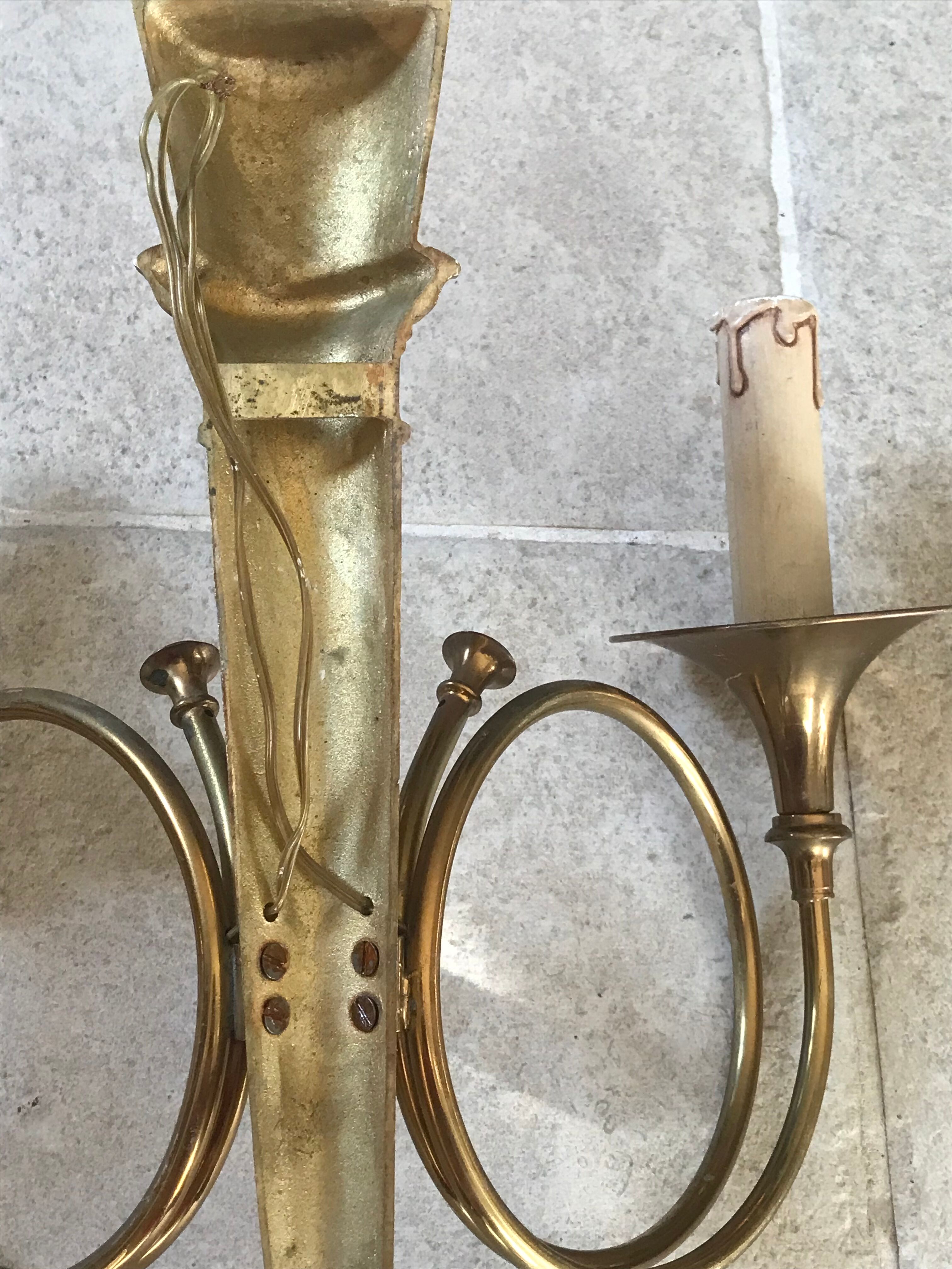 Pair of gilded bronze wall lamps