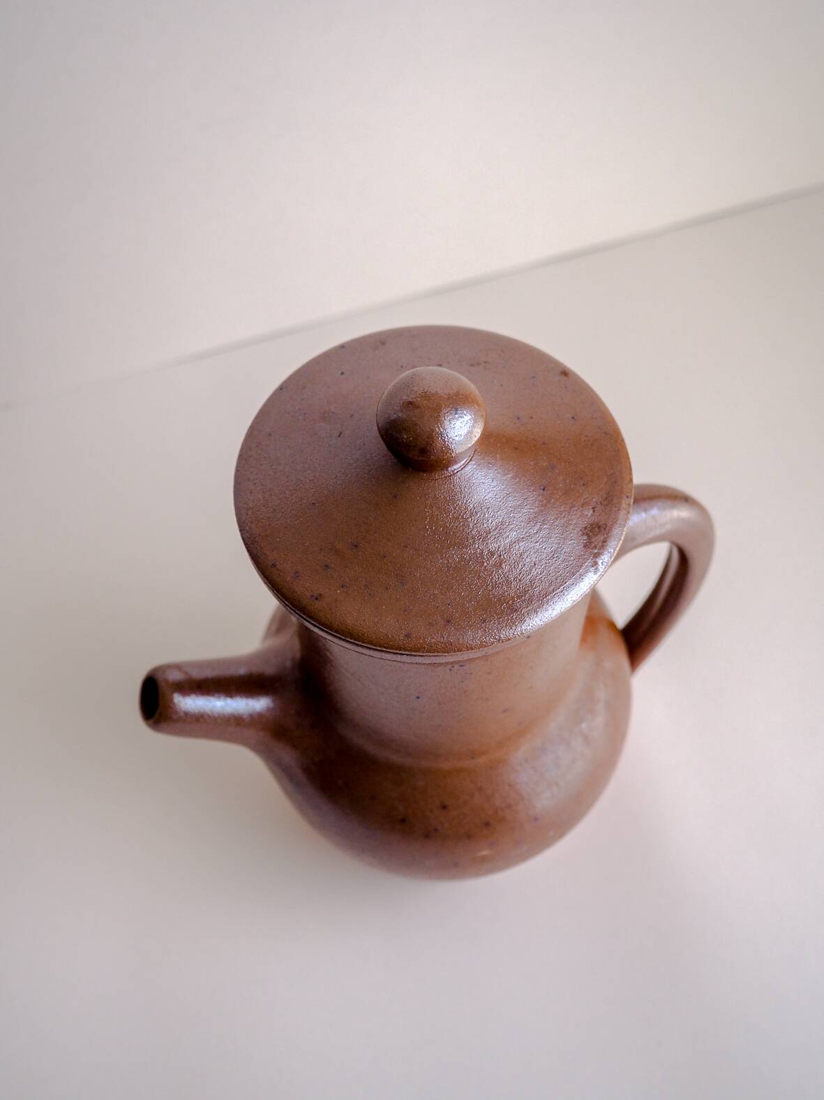 Handcrafted stoneware teapot with strainer