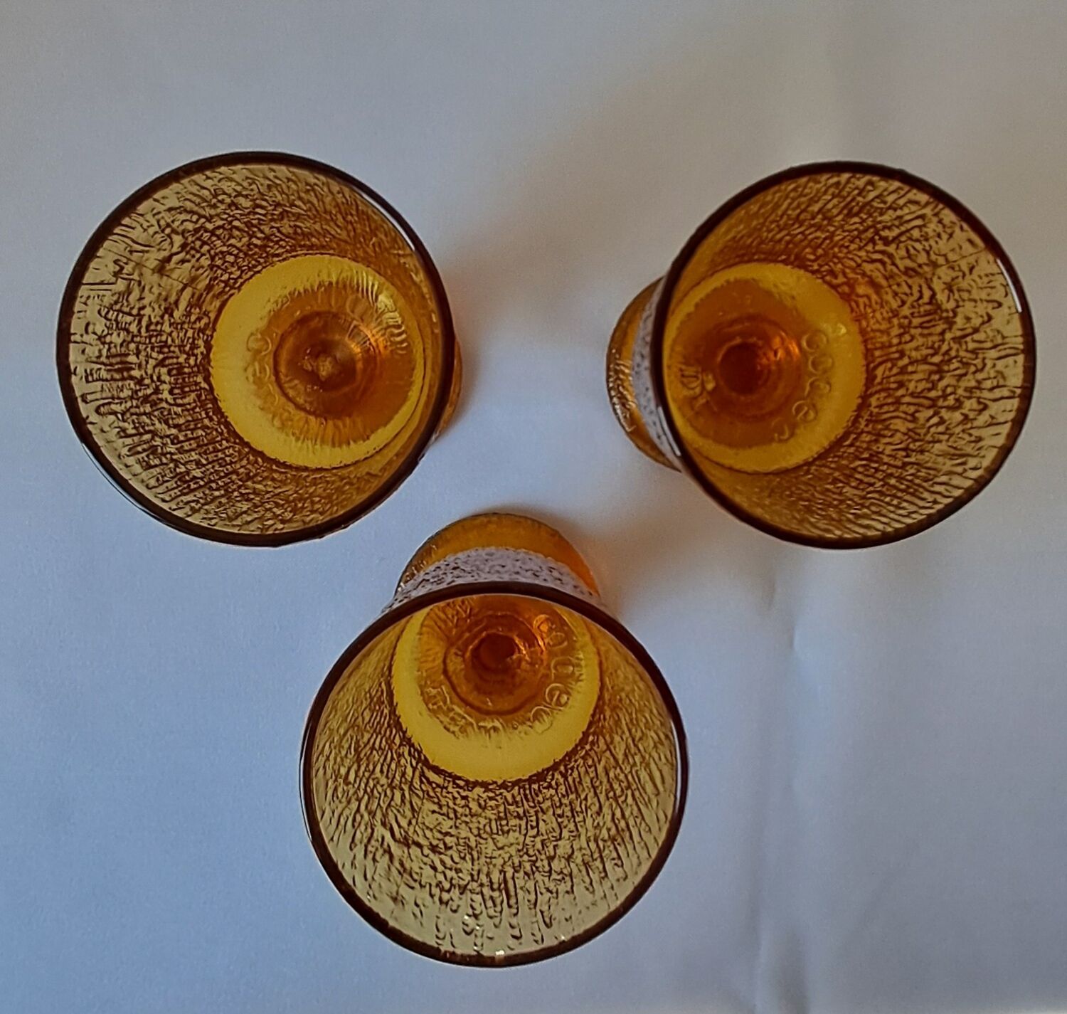 3 textured amber stemmed glasses. Vintage.