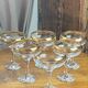 Champagne coupes or cocktail glasses with gilding