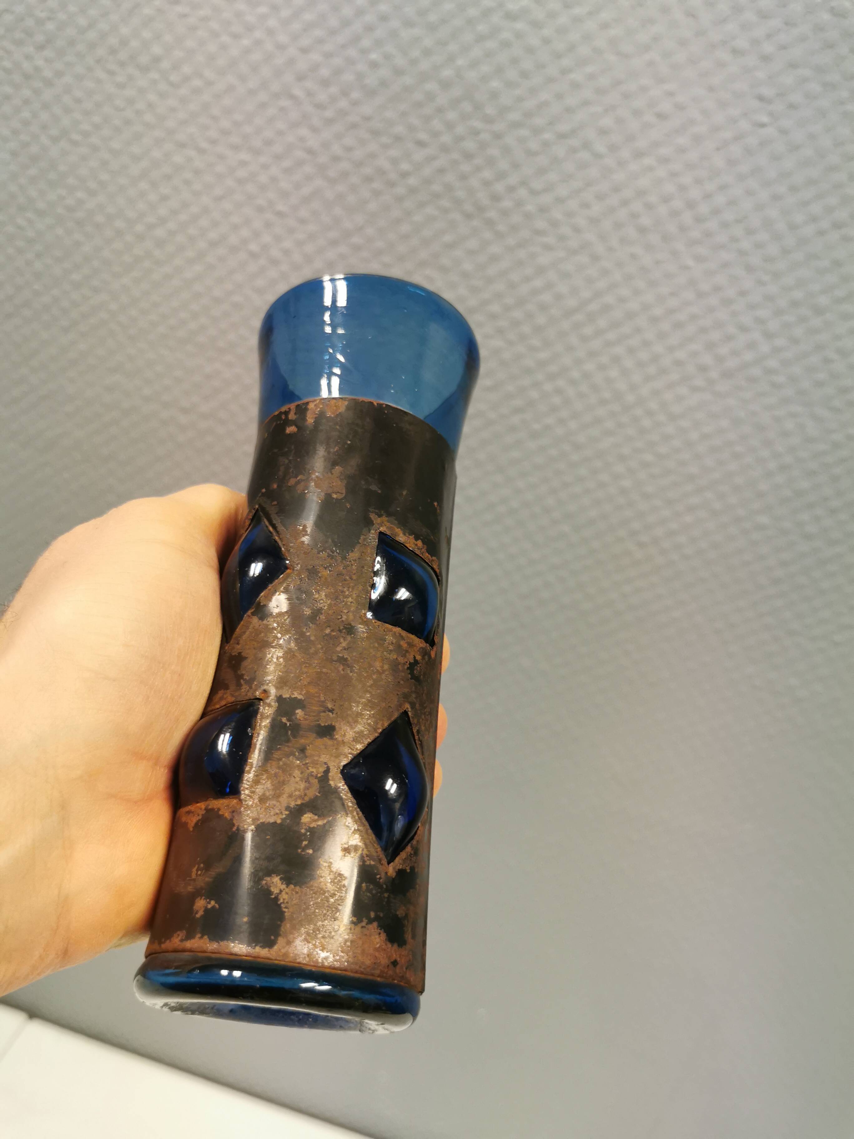Brutalist style vase with inner blue glass mouth-blown out through the metal "frame".