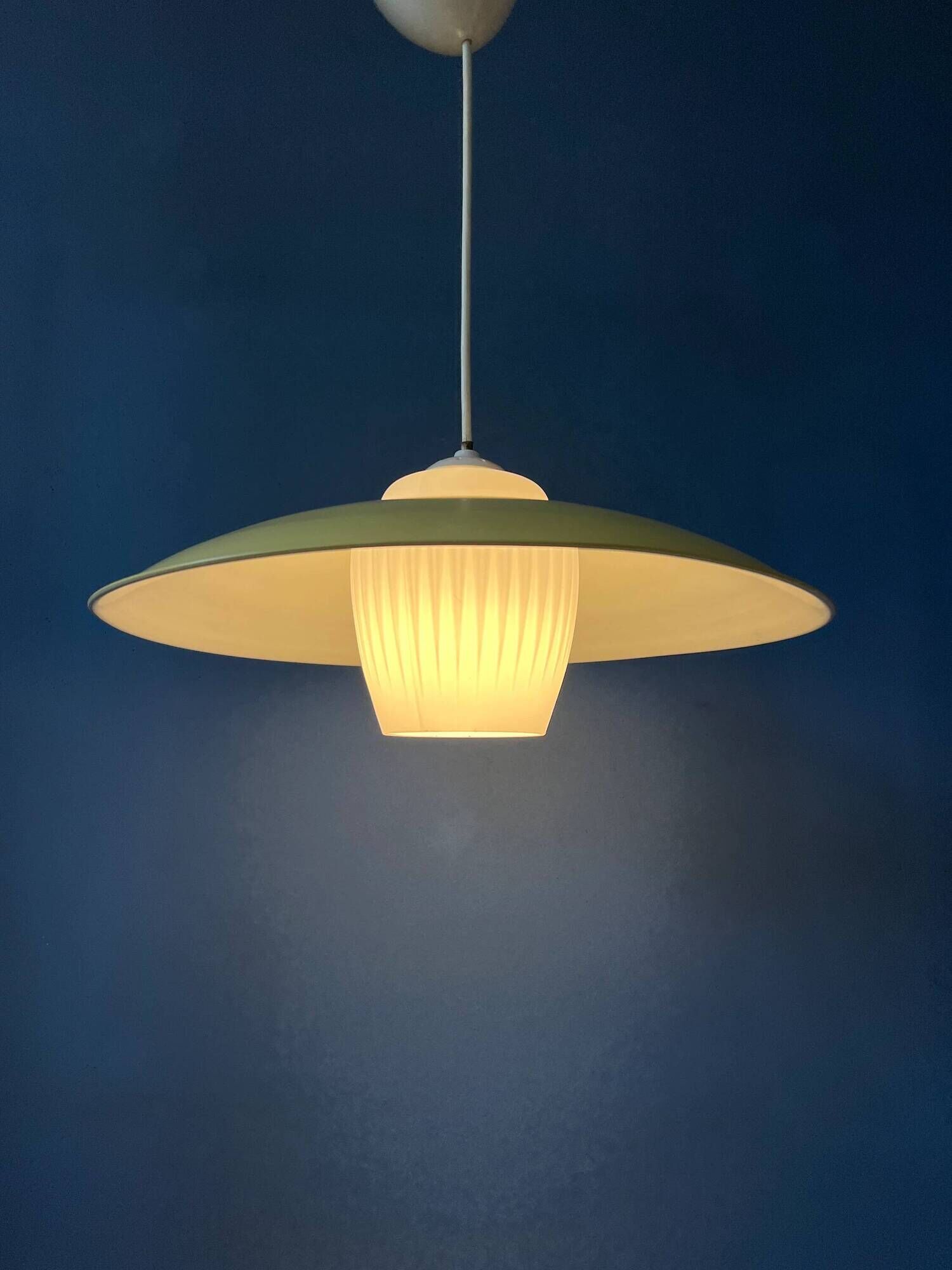 Danish mid-century suspension with opaline glass shade and yellow metal cover.