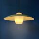 Danish mid-century suspension with opaline glass shade and yellow metal cover.