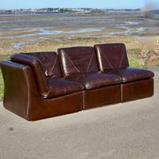 Modular sofa made up of 3 leather armchairs. Circa 1970