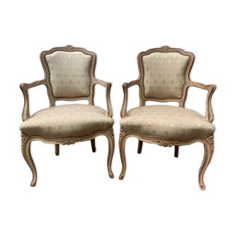 Pair of Louis XV style convertible armchairs in patinated beech XX century