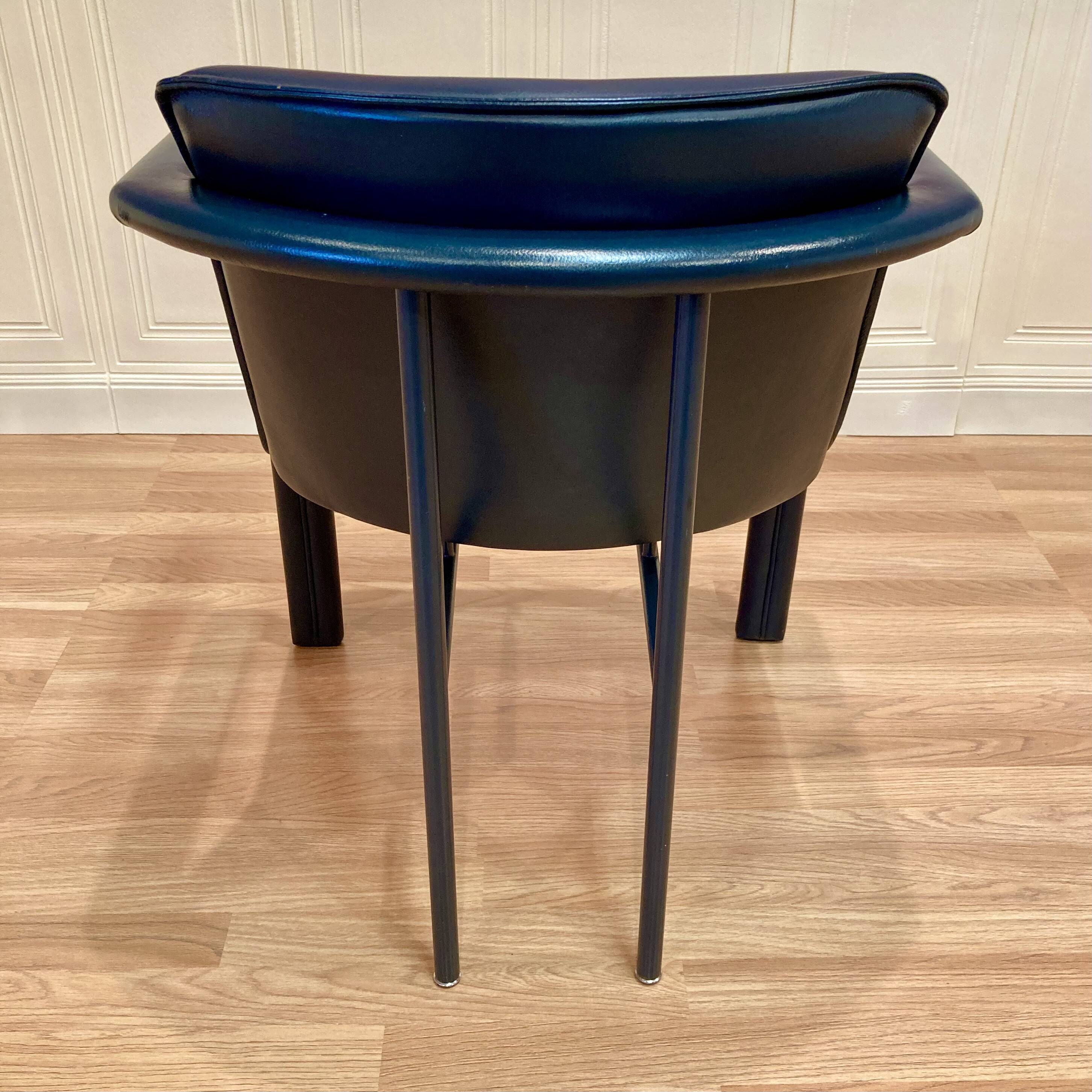 "Leolux" designer leather and metal armchair.