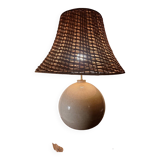 Ceramic lamp with rattan lampshade.