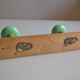 Wall coat rack with 2 hooks, wood and plastic, 60s style.