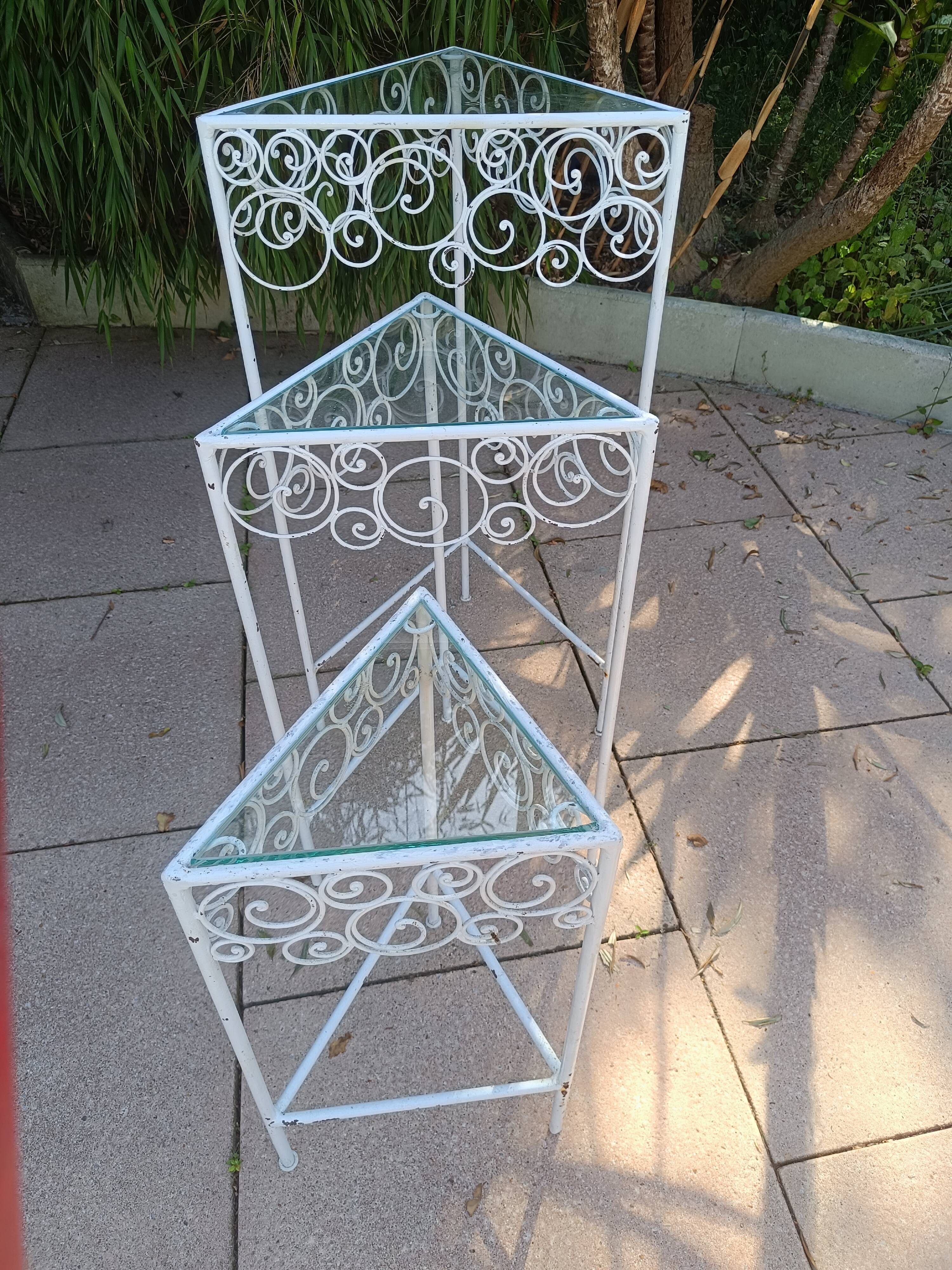 3 nesting tables in white wrought iron. Beveled glass.