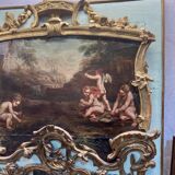 Antique trumeau mirror with putti decoration