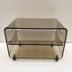 Table basse plexi fumé Roche Bobois