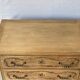 Vintage Louis XV chest of drawers renovated in raw and carved wood