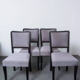 Set of 4 black and grey Art Deco chairs made of painted wood and upholstery fabric.