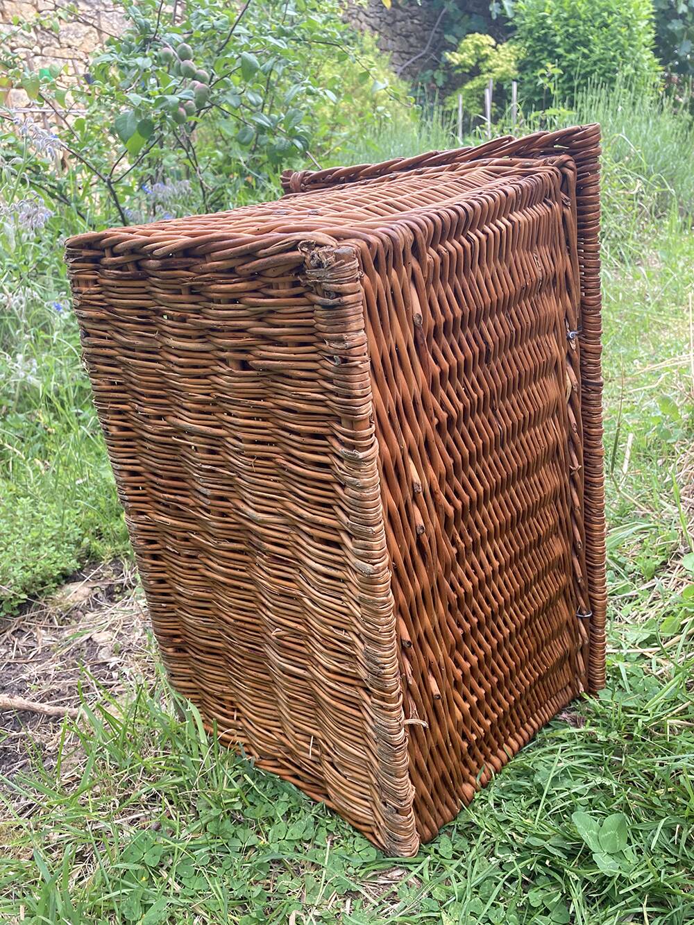 Old wicker basket with closure and handle