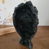 Black ceramic face sculpture