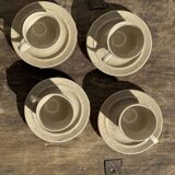 Set of 4 vintage speckled beige stoneware coffee cups.