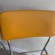 LM vintage chrome and orange/mustard yellow faux leather chairs