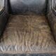 Set of 2 black cow leather armchairs finished with decorative nails, industrial style