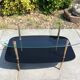 Glass and brass coffee table