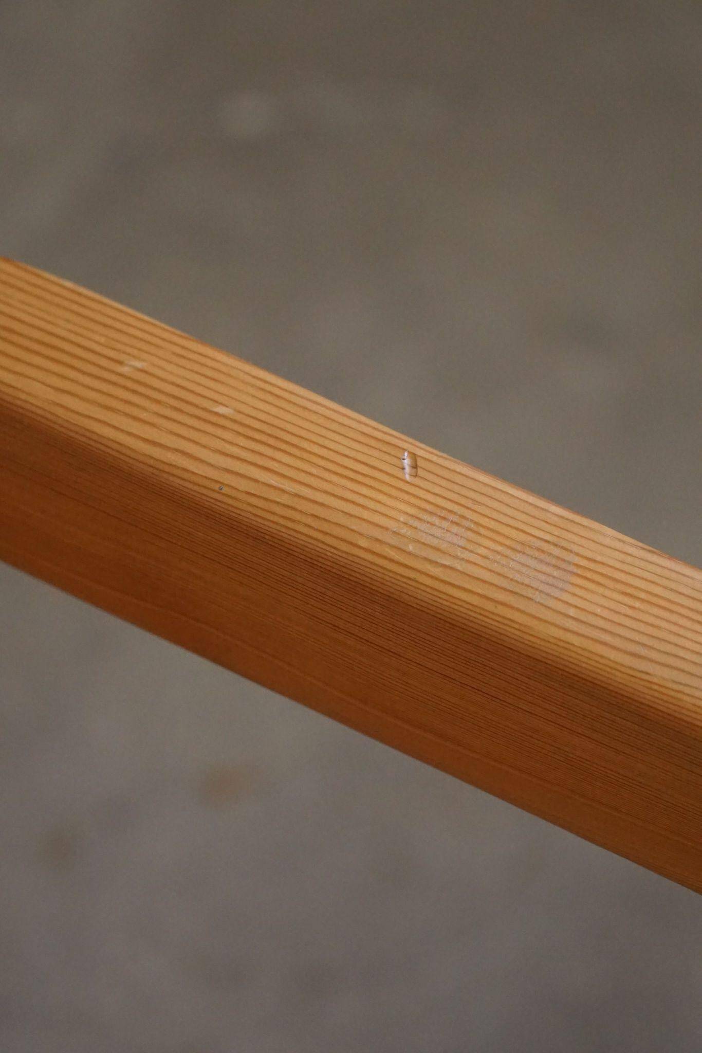 Tage Poulsen, a pair of brutalist chairs in pine and cord, Danish modern style, 1970s.