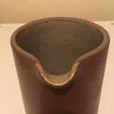 Small pitcher in patinated sandstone