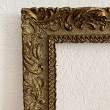 Old frame in gilded wood with stucco decoration circa 1900