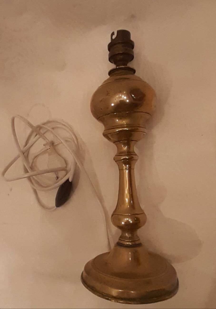 Old lamp foot in electrified brass