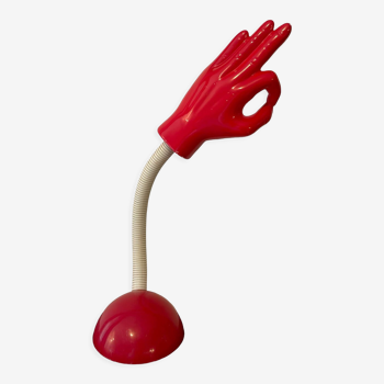 Articulated desk lamp in the shape of a vintage red and white hand