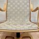 Grand fauteuil pivotant et son ottoman "design scandinave".