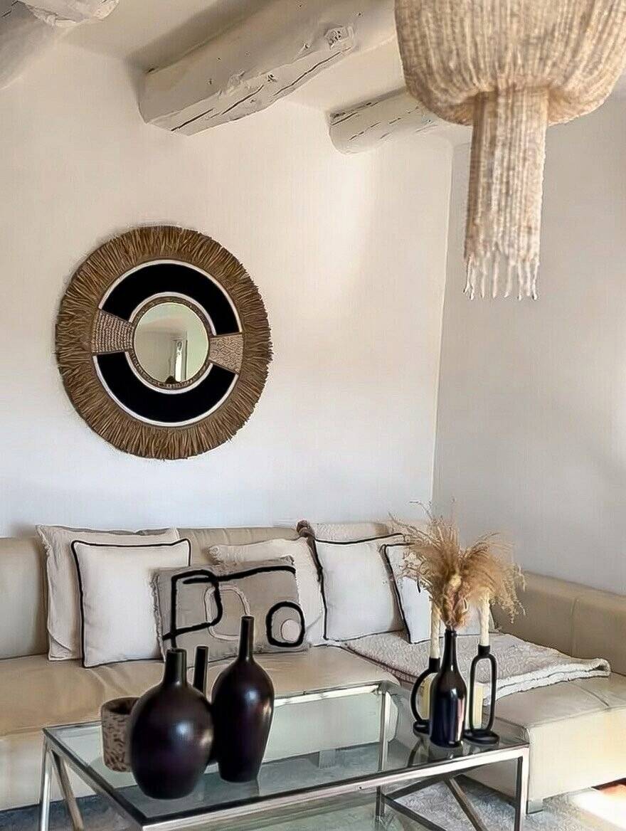 Miroir noir en raphia & plume
