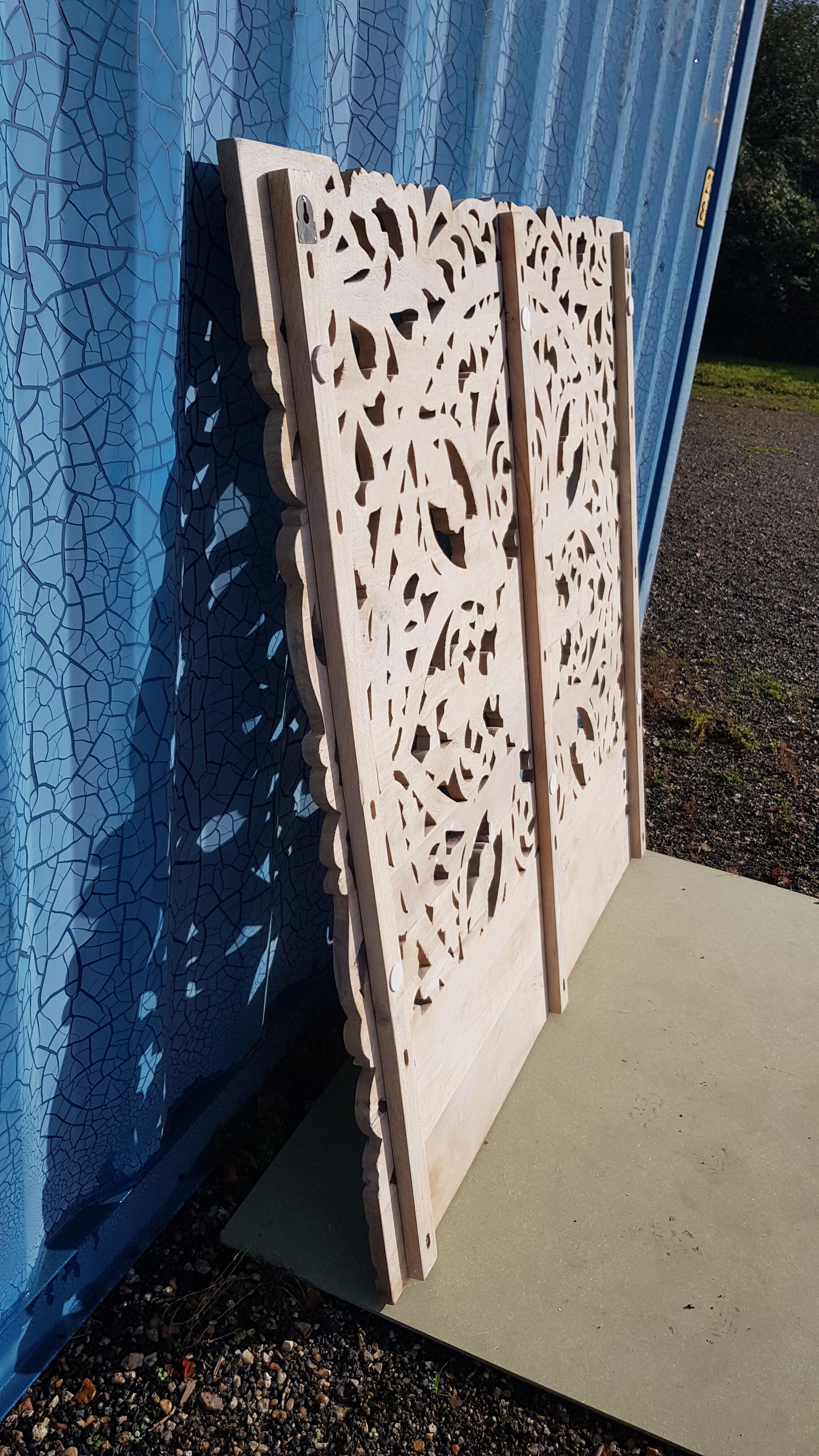 Carved mango headboard