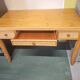 Rattan and varnished pine desk