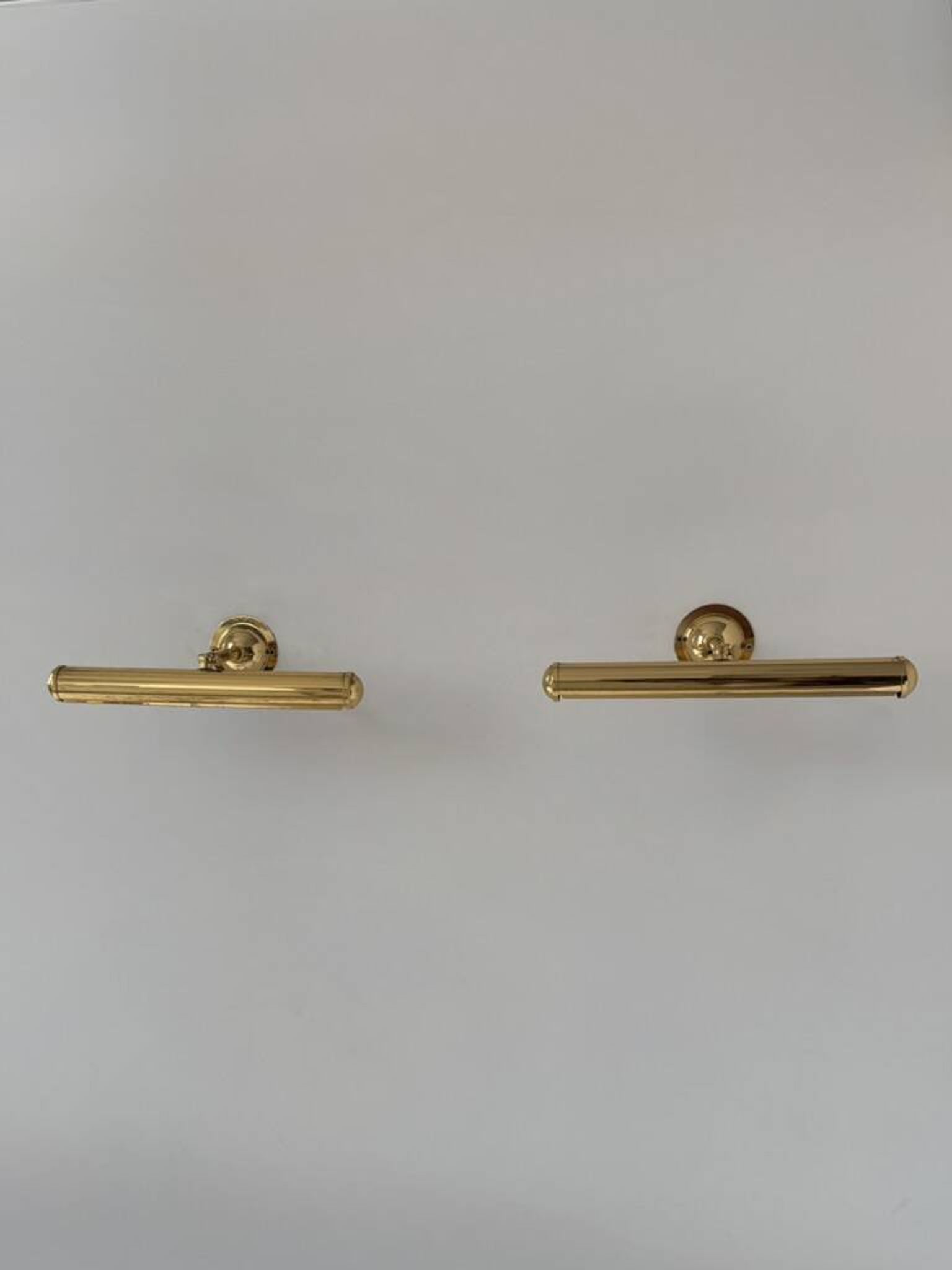 Pair of adjustable vintage brass wall lights, France, 1970.