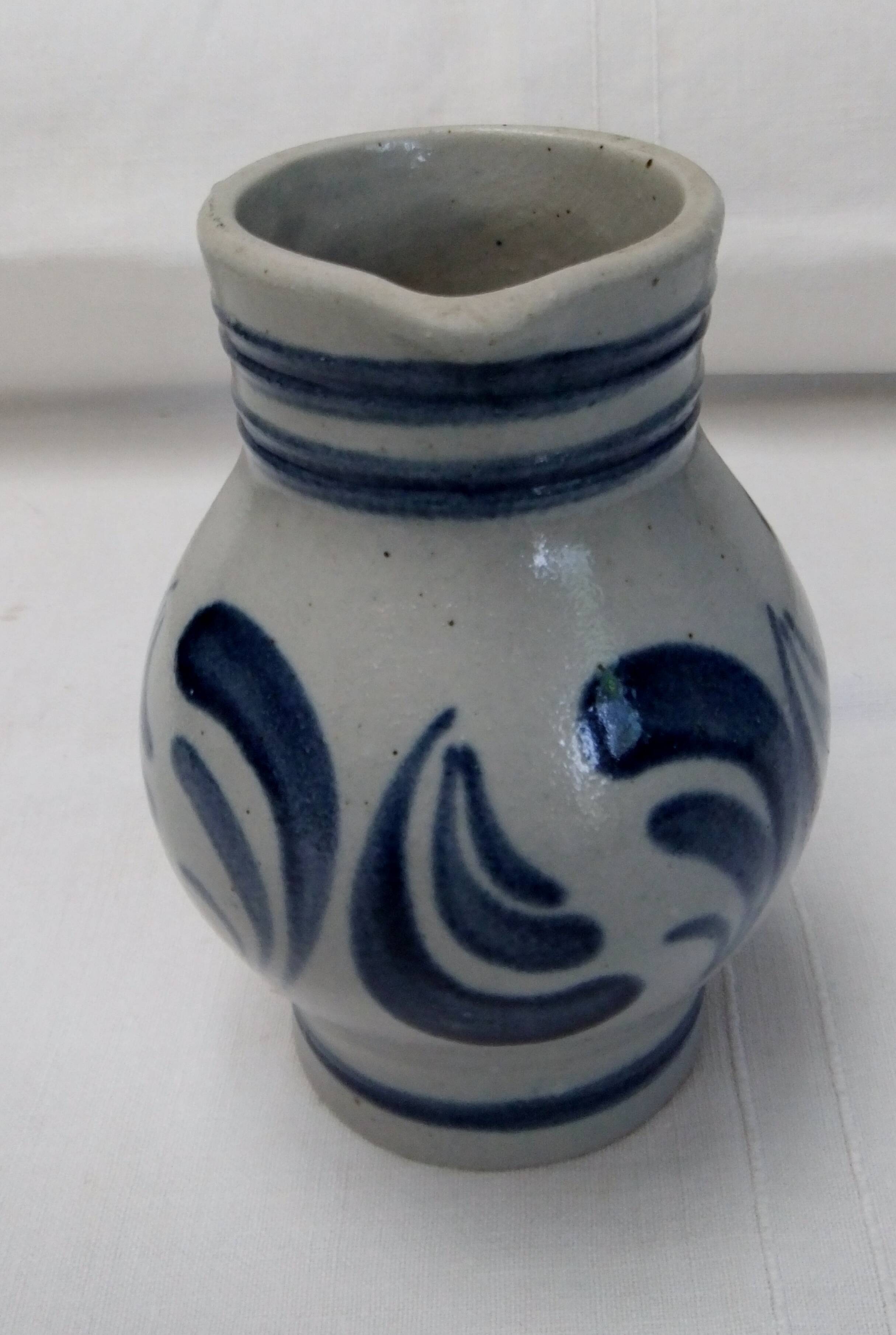 Handmade glazed stoneware pitcher with Handarbeit inscription