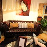 Real chesterfield sofa in dark brown tins