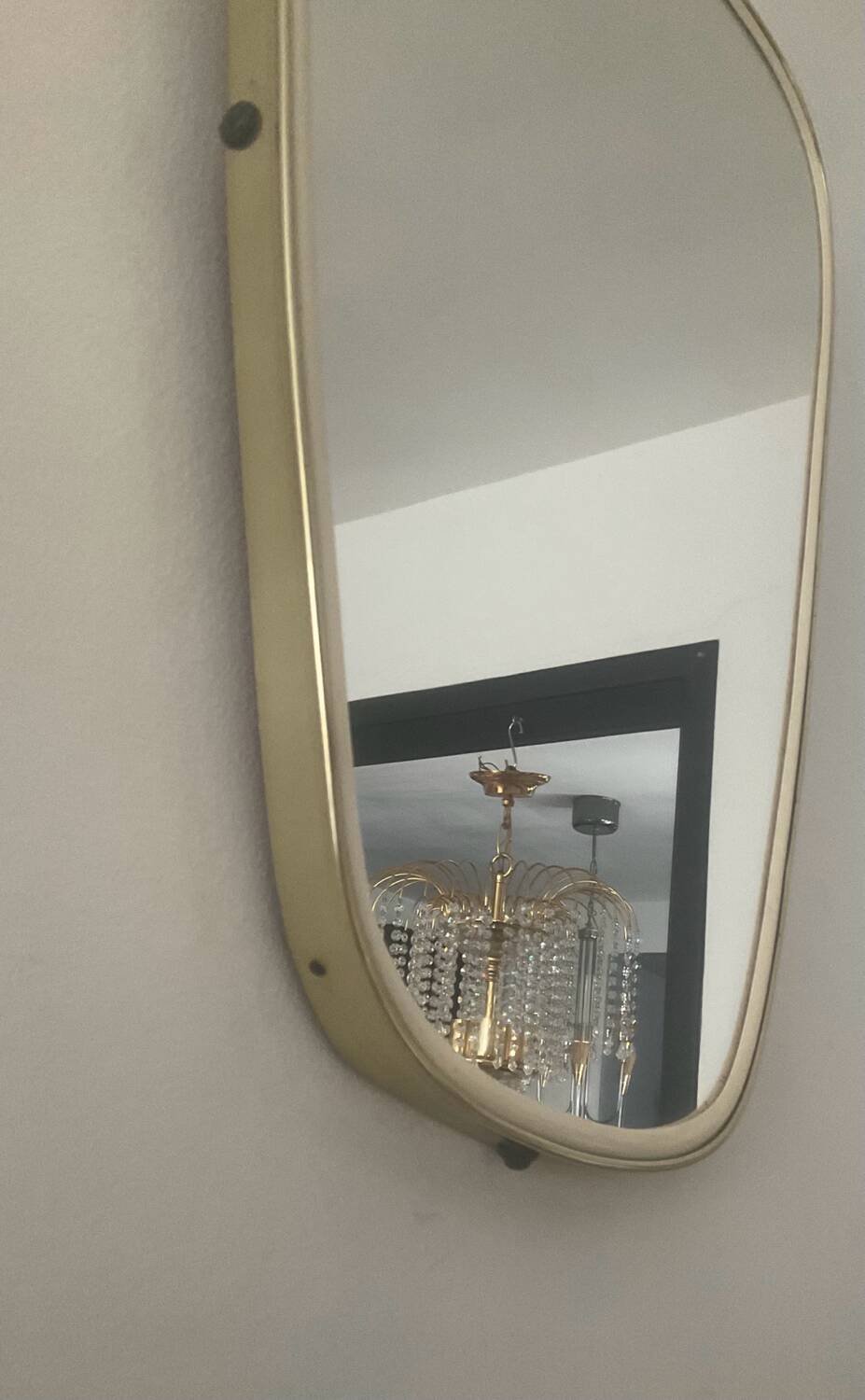 Asymmetrical free-form mirror from the 70s