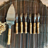 6 bamboo forks and a pie server