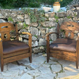 Pair of armchairs in stained wood and leather, 20th century