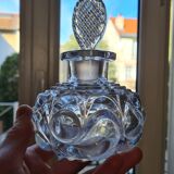 Old perfume bottle in molded