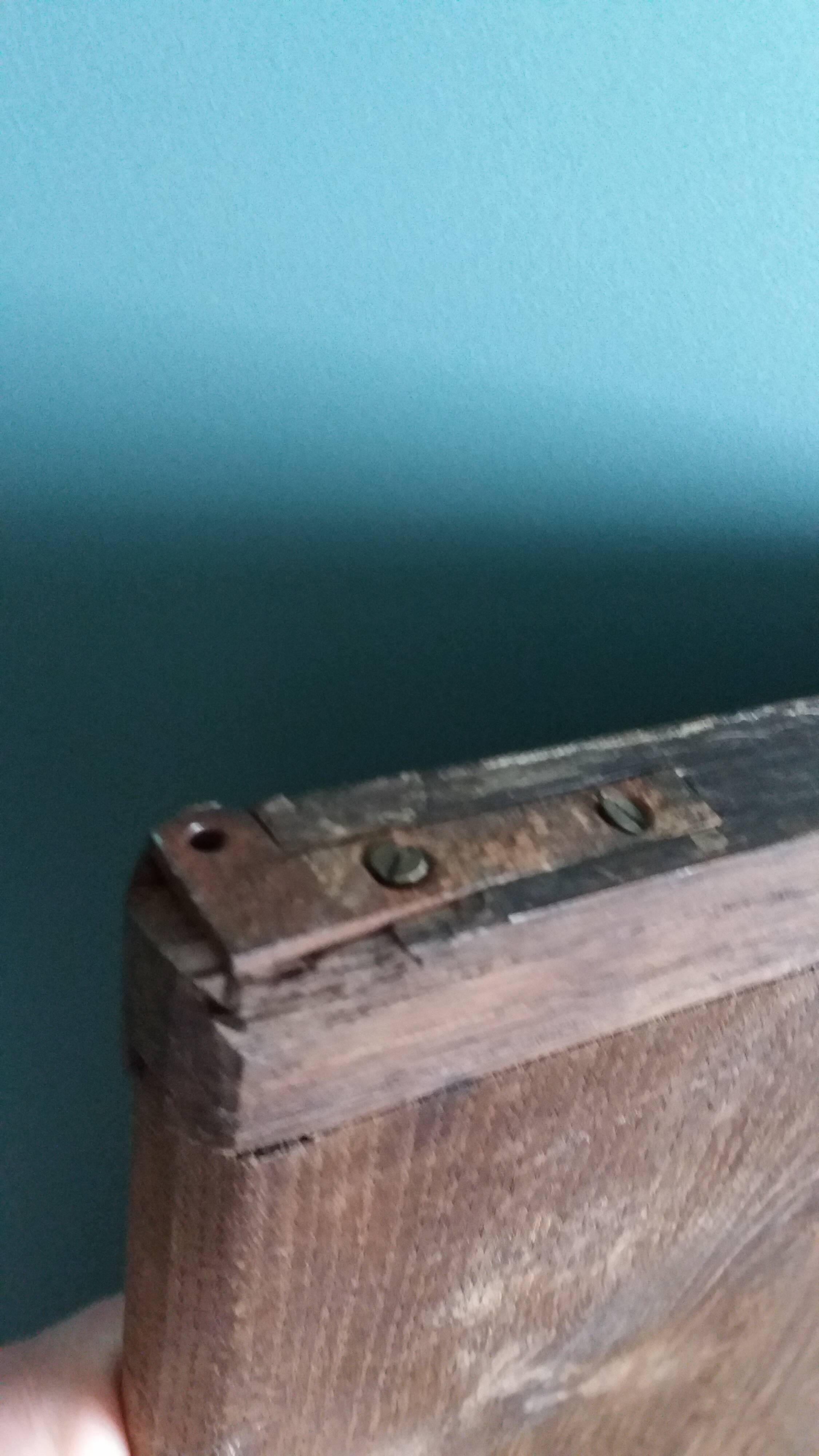 Old door with a bronze handle