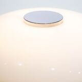 Chrome floor lamp with white lampshade