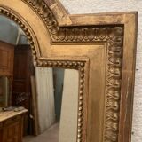 Louis XVI style mirror in wood and gilded stucco XIX century