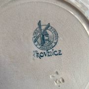 3 flat plates in ironstone with a green floral border