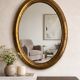 Antique oval gold mirror in Louis XVI style - beautiful patina.