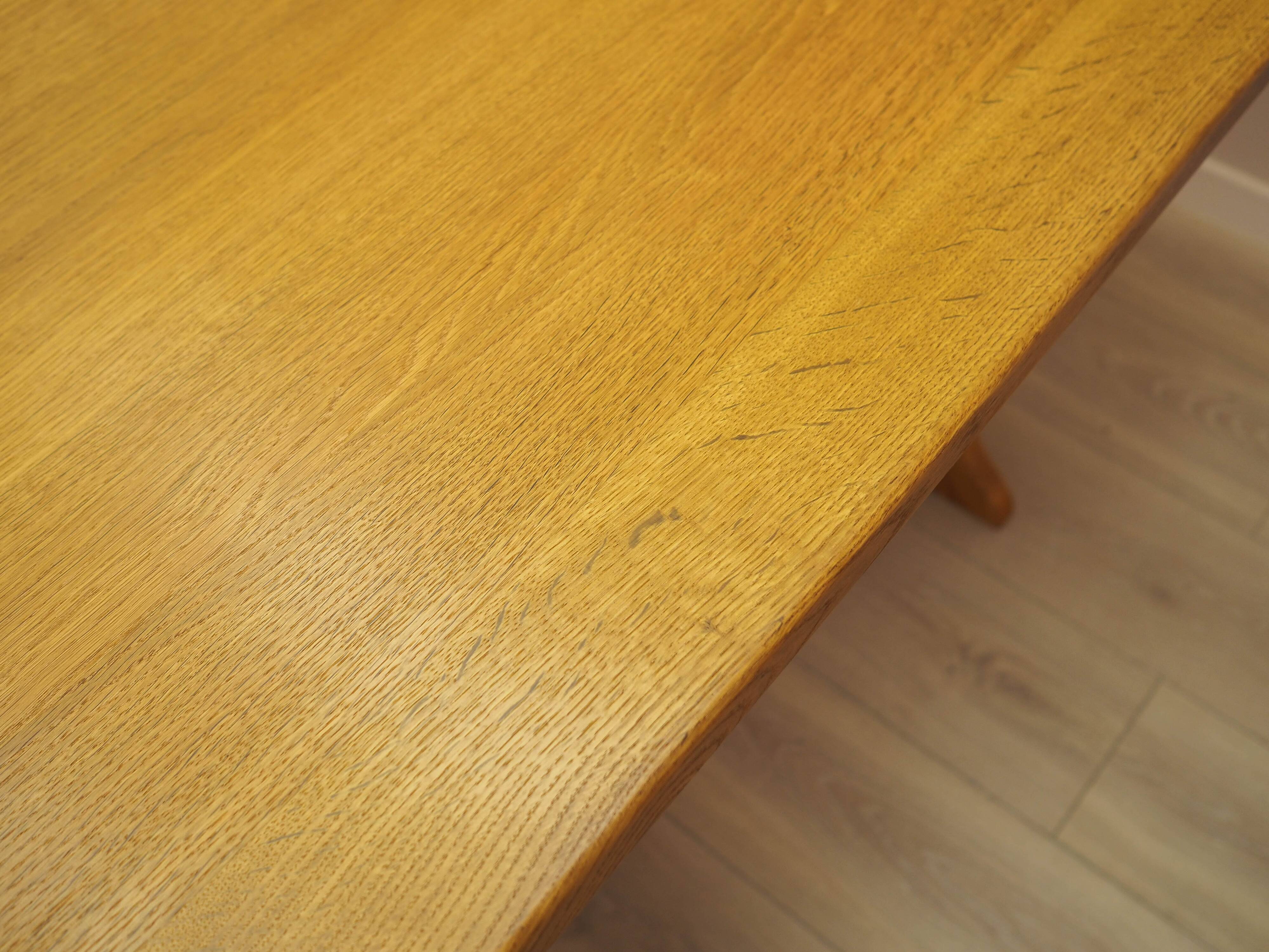Solid oak dining table by Henning Kjærnulf, Denmark, 1960s