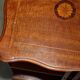 Sheraton-style rotating library table in walnut and satinwood.