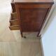 Empire/Restoration style console table with scrolled ends, mirrored back, and claw feet.