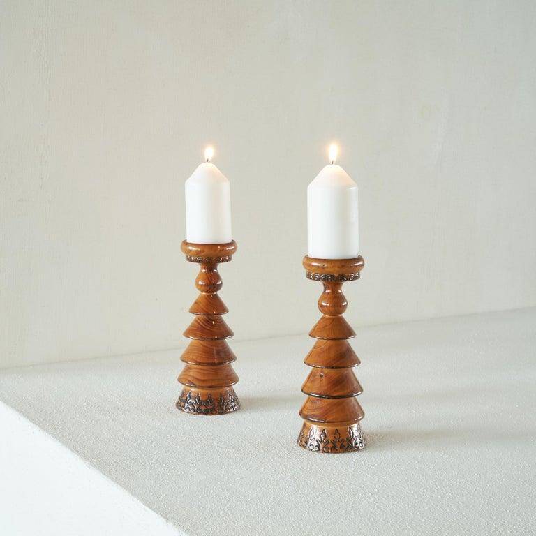 Pair of Scandinavian lacquered wooden candle holders