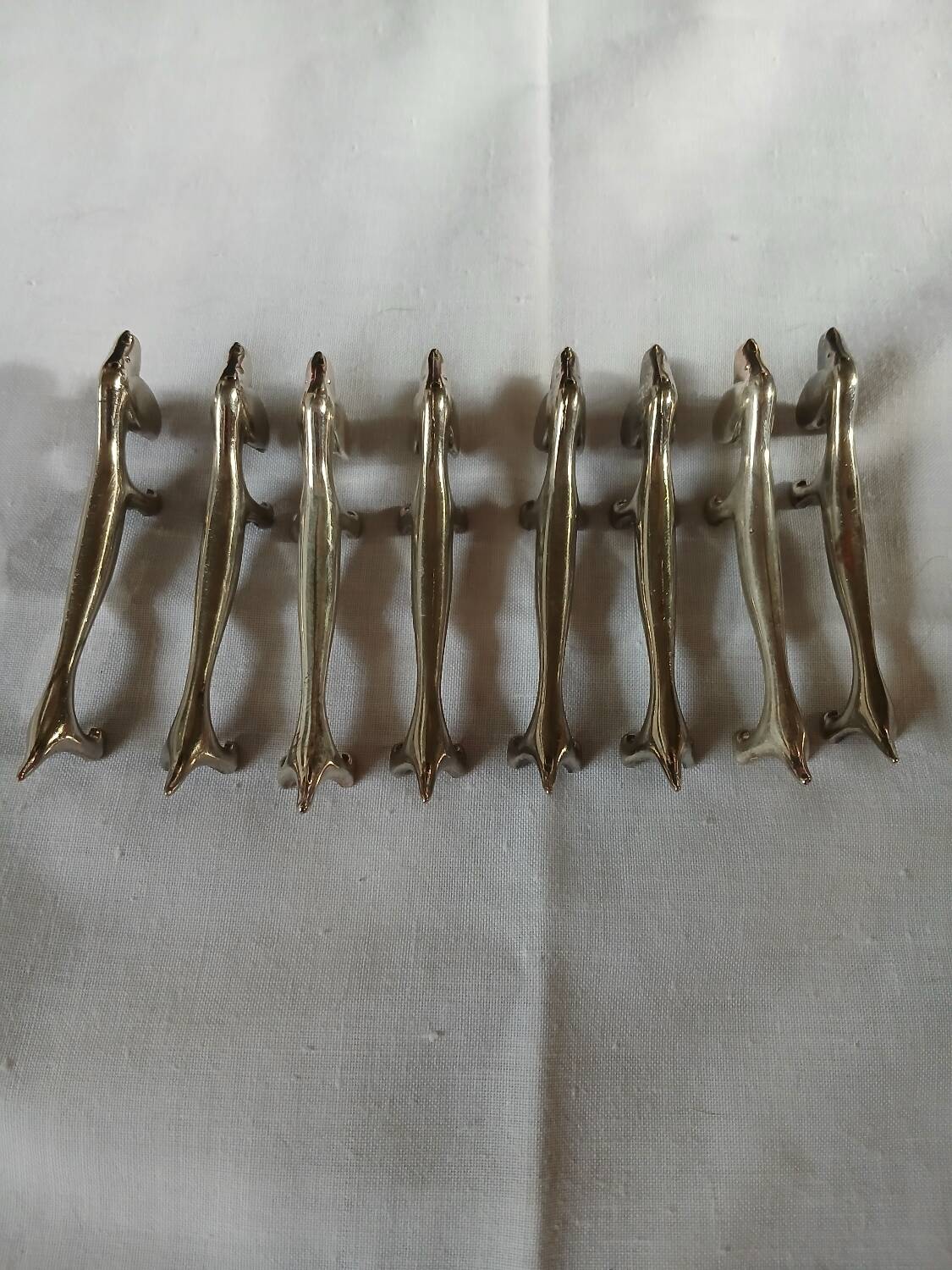 8 metal knife holders/dogs