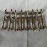 8 metal knife holders/dogs